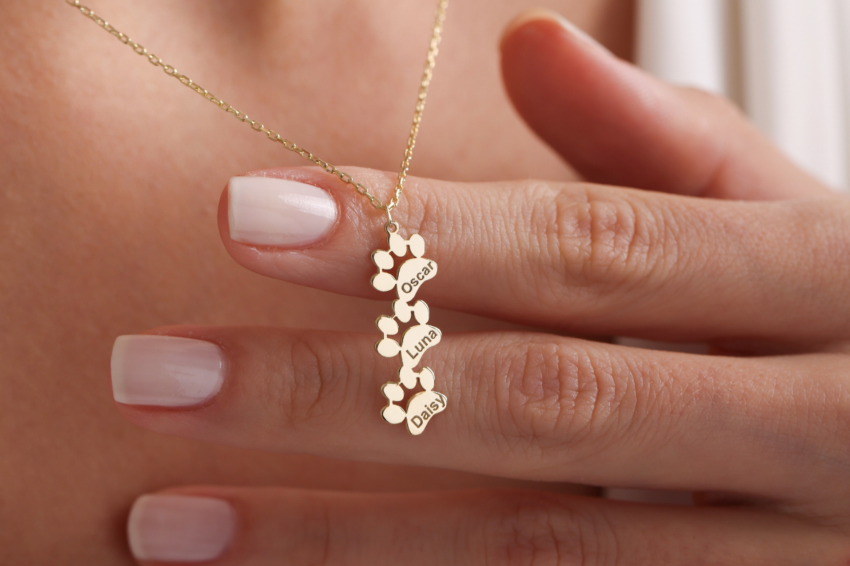 Personalised paw print name necklace in sterling silver – custom pet memorial jewellery by NY Jewellery