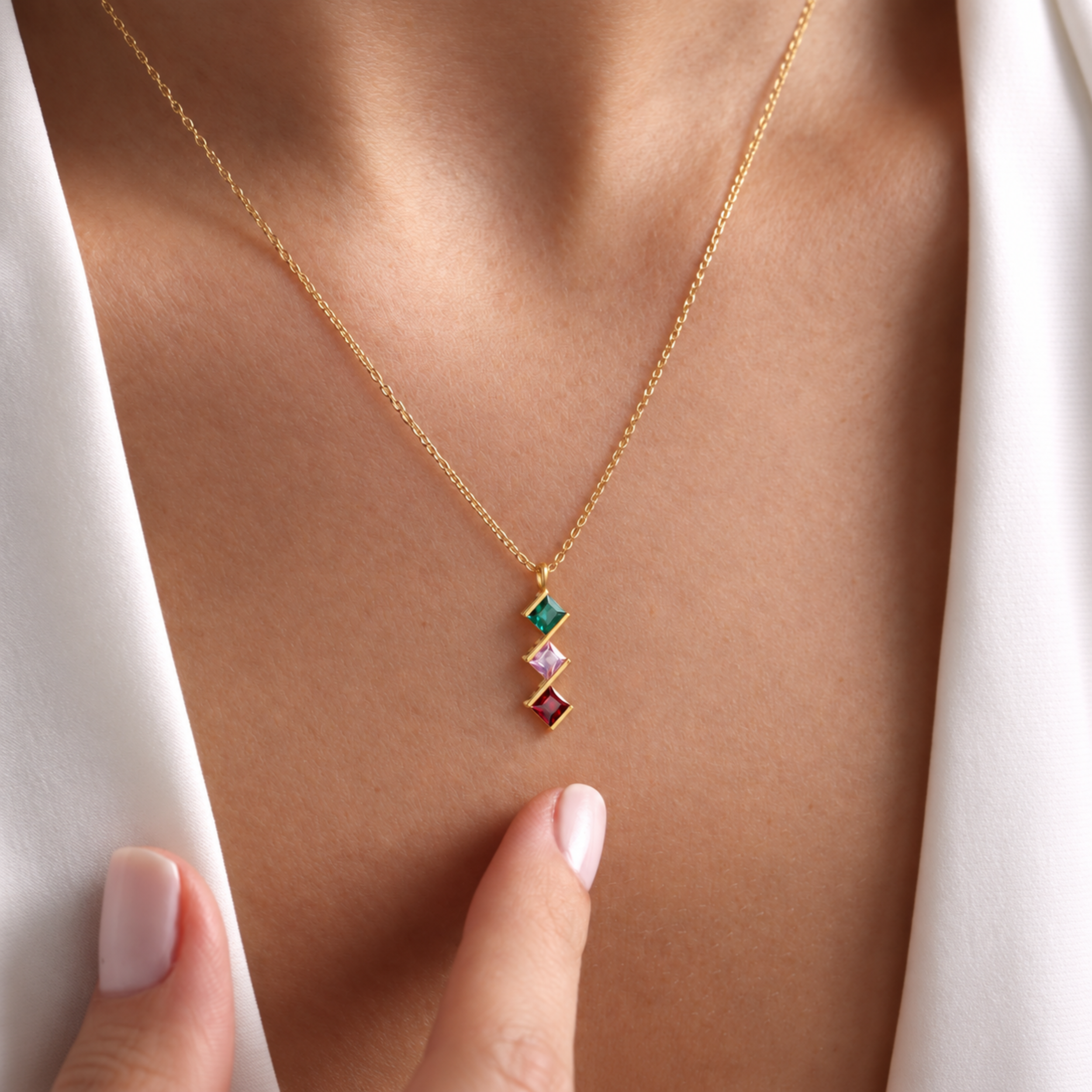 Vertical family birthstone necklace close-up — square-set gemstones in sterling silver